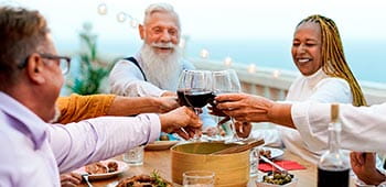 People enjoying a meal outside together